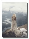 kvinne i hvit kjole stående på fjellkanten ser utover landskapet og elven  thumbnail